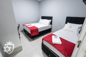 Ένα ή περισσότερα κρεβάτια σε δωμάτιο στο JBR Park Hotel