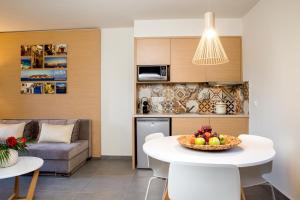 Kuchyň nebo kuchyňský kout v ubytování Sundance Apartments & Suites
