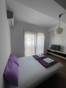 Ένα ή περισσότερα κρεβάτια σε δωμάτιο στο Stefea Center Apartment - Free Garage - Central +19 φωτογραφίες