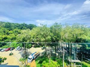 a group of cars parked in a parking lot at Utopia Loft Condo Naiharn Beach in Nai Harn Beach