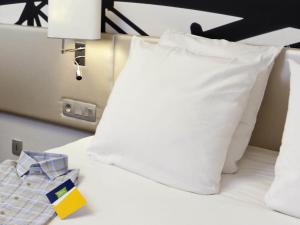 Кровать или кровати в номере ibis Styles Paris Tolbiac Bibliotheque