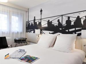 Кровать или кровати в номере ibis Styles Paris Tolbiac Bibliotheque