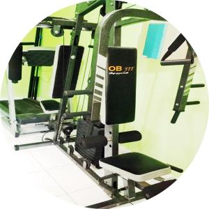 a gym with two tread machines in a room at Bakom Inn Syariah in Bogor