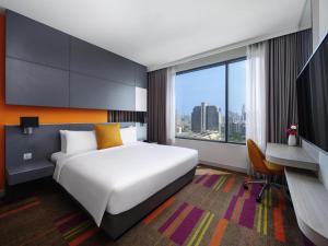 Postelja oz. postelje v sobi nastanitve Mercure Bangkok Siam