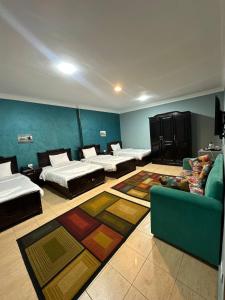 Postel nebo postele na pokoji v ubytování New pyramid inn