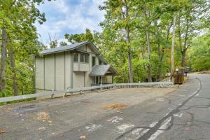 a house sitting on the side of a road at Margaritaville Lake Resort Home 1 Mi to Marina! in Damsel