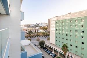 an overhead view of a building with a parking lot at Modern Luxury Oasis in Tangier