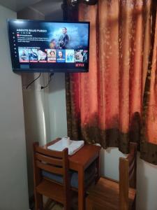 TV a/nebo společenská místnost v ubytování Hostal Leo
