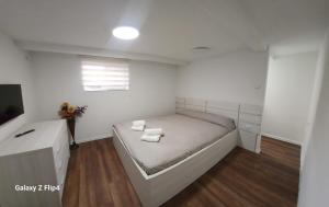 Ένα ή περισσότερα κρεβάτια σε δωμάτιο στο Guest Suite SUZY