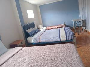 Ένα ή περισσότερα κρεβάτια σε δωμάτιο στο Hotel Nala