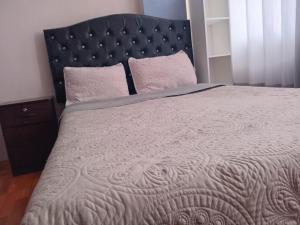 Ένα ή περισσότερα κρεβάτια σε δωμάτιο στο Hotel Nala