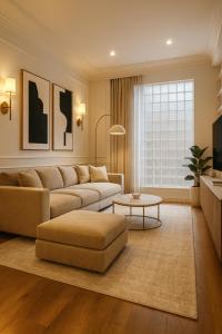 a living room with a couch and a table at Stylish Santa Monica House - Top Location in Los Angeles