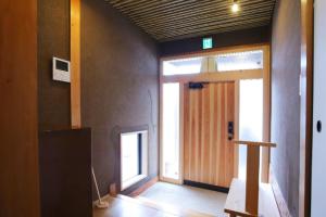 an empty room with a door and a window at Potsupotsuan - Vacation STAY 20035 in Ise
