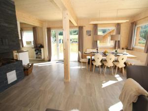 a large living room with a table and chairs at Das Edelweiss in Hohentauern +16 photos