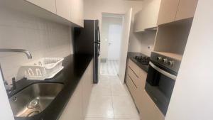 Η κουζίνα ή μικρή κουζίνα στο Tu estancia perfecta