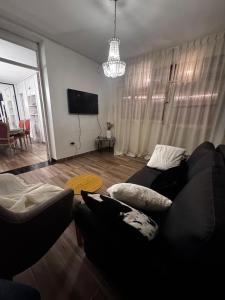 Μια τηλεόραση ή/και κέντρο ψυχαγωγίας στο Espacio Casa Ser - Cochera incluida