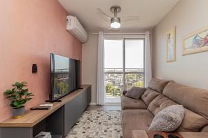 Μια τηλεόραση ή/και κέντρο ψυχαγωγίας στο APT° Aconchegante Acqua Park
