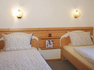 Ένα ή περισσότερα κρεβάτια σε δωμάτιο στο Holiday home with 2 bedrooms