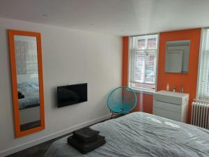 Postel nebo postele na pokoji v ubytování Centraal aan Zee