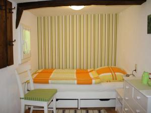 Ένα ή περισσότερα κρεβάτια σε δωμάτιο στο Holiday apartment Zum Torfstecher