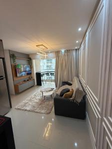 Χώρος καθιστικού στο Apartamento alto padrão de 2 quartos com Garagem