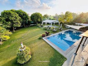 an overhead view of a backyard with a swimming pool at Villa Kathreyna Private Resort in Alianza