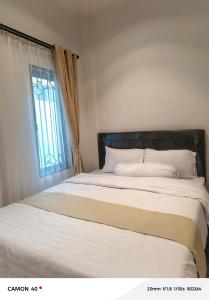 Una cama o camas en una habitación de CBD Studio Loft 1A at City Center!