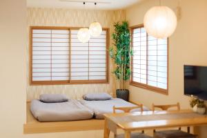 Televisyen dan/atau pusat hiburan di Ueno Residence Hotel Matsumoto