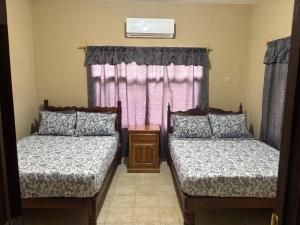 Postel nebo postele na pokoji v ubytování Double S Vacation Home