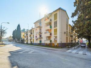 a building on the side of a street at Premium apartment Peschiera Porec in Poreč