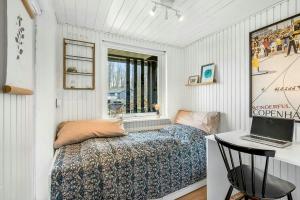 Postel nebo postele na pokoji v ubytování Holiday Home Between Forest And Beach In Haderslev