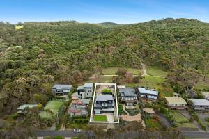 an aerial view of a house in a forest at Eleve Lorne in Lorne
