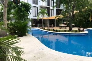 Bazén v ubytování Comfortable place in Playa nebo v jeho okolí