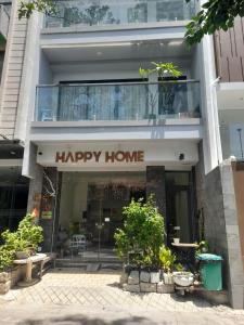 a happy home sign on the front of a building at HAPPY HOME - economy room in Nha Trang
