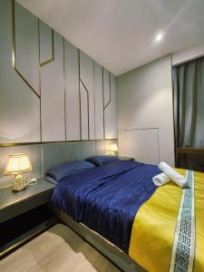 Ένα ή περισσότερα κρεβάτια σε δωμάτιο στο Hill10 ICity Homestay by Define Suite 344