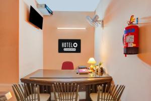 Et tv og/eller underholdning på Hotel O Green City Dhakoli Formerly Swagat