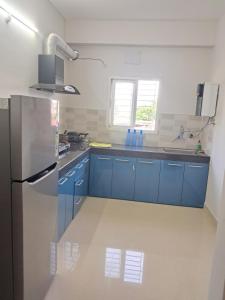 Kuchyň nebo kuchyňský kout v ubytování La Vita Oasis + 9 fotografií