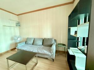 a living room with a couch and a table at SHaCk Place 87 in Ban Puk (2)