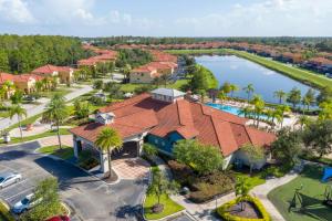 an aerial view of a resort with a swimming pool at Luxury 12BR Home w Pool Theater Game Room in Kissimmee