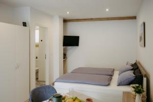 Una cama o camas en una habitación de Apartment Sabine