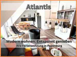 a living room with a kitchen and a dining room at "Atlantis" Papenburg Dachterrasse Einbauküche Neubau 74 qm Free Wifi 2 Schlafzimmer bis 4 Personen in Papenburg