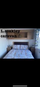 Ένα ή περισσότερα κρεβάτια σε δωμάτιο στο Caravan winkups