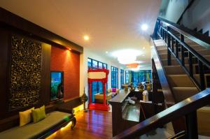 Posezení v ubytování Nicha Suite Hua Hin Hotel