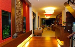 Posezení v ubytování Nicha Suite Hua Hin Hotel