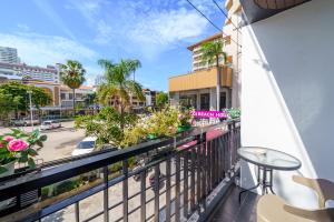 a balcony with a view of a street at Z8 beach hotel in Jomtien Beach