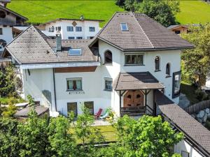 an aerial view of a white house at Data Castle in Kaltenbach