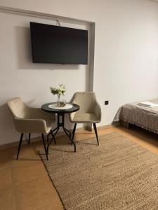 Una cama o camas en una habitación de River Garden House