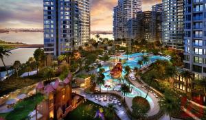 an aerial view of a resort with a pool at Diamond Island - Mekong Retreat Apartment in Ho Chi Minh City
