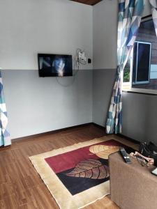 Μια τηλεόραση ή/και κέντρο ψυχαγωγίας στο Homestay Teratak D'Desa