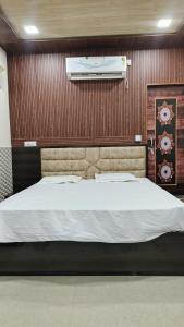 Postel nebo postele na pokoji v ubytování Prem Garden & Resort